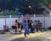 Anela dancing a fun Hawaiian song with Artie Partin( guitar) and CJ Helekahi (ukulele), in Kihei, Maui.