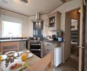 Welcome to Ayr Holiday Park. Here is the description and look inside our 2015 Roxbury static caravan!nnIf you’re holidaying in a large group, or just prefer to have a bit more space, the comfortable Roxbury caravans have a useful third bedroom. Most of these high-spec caravans also have lovely sea views (please check when you book), and all have light and contemporary décor. The large sitting area is comfortable and tastefully furnished, with a modern-style electric fire for cooler days. The