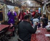 Video by Carrie EidsonnStory by Hayley BentonnnRounding the bend on Woodfin Avenue, the spirit of the season is felt almost instantaneously upon arrival. It’s hard not to smile.nnGreetings of “Merry Christmas!” and carols sung by children — huddled together atop a restored 1950 Alexander Railroad Company No. 7 train engine — ring out, bringing a bit of sunshine to an otherwise dreary winter day.nnAfter climbing aboard a parked 1925 trolley, passengers are rewarded with sugar cookies an
