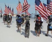 Stepping of from Miami Beach&#39;s Lummus Park (pronounced Loomis) is the Parade of Flags—the final mile of theSouth Florida Council Boy Scouts of America&#39;s 49th Barefoot Mailman in 2013.