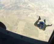 Texas Army National Guard Parachute Demonstration Team jumping from a UH-60 at Skydive Temple in January 2014. Members are from various TXARNG units including Able Co. 1st BN 143rd (Airborne) Infantry Regiment.