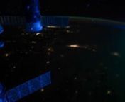 The Northern and Southern Lights as seen from the International Space Station. From 400 km (250 mi) above the earth the the constantly orbiting ISS is witness to beautiful streamers of green and red light emanating from the collision ofhighly charged particles from solar winds with oxygen and nitrogen atoms in the earth&#39;s atmosphere. Centered around the northern (Aurora Borealis) and southern (Aurora Australis) poles the Auroras move in an almost hypnotic dance in the atmosphere below the spac