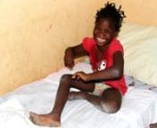This is little Nerland. She is blind and lives in LA Gonâve, Haiti. Her whole life she has slept on the floor, but today, she gets in her very own bed. Her reaction will bring tears to your eye.