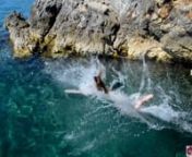 Nudist Girl Jumping and Floating in the Rocky Sea Free HD Video