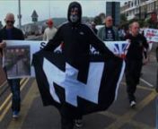 National Front, National Action and other far right groups march on an anti-immigration protest in Dover, UK.nnThe protest was attended by Nick Griffin, the recently disgraced ex-leader of the British National Party.nnNational Action were proscribed as a terrorist organisation in December 2016, following the murder of Labour MP Jo Cox.nnHD footage © Jason N. Parkinson available via jasonnparkinson@gmail.comnnTermsnThese video are for viewing only and may not be embedded or otherwise published w