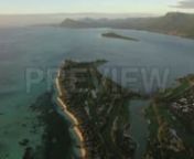 Get 100&#39;s of FREE Video Templates, Music, Footage and More at Motion Array: https://www.bit.ly/2UymF81nGet this here: https://motionarray.com/stock-video/le-morne-brabant-peninsula-70220nnThis stock videos shows the aerial view of the Le Morne Brabant peninsula located at the extreme southwestern tip of the Indian Ocean island of Mauritius. It is on the windward side of the island nation of Africa. The clip features a green area surrounded by blue lagoons and the ocean, houses and a resort along