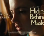 Full release 3rd of November! – Official Teaser Trailer for the film &#39;Hiding Behind Masks&#39;. Written &amp; Directed by Leonard RääfnnProduced by Flook L. Nielsen &amp; Mathias Skaarup SchmidtnStarring Rosemarie Mosbæk, Marie Boda and Martin BrygmannnnSynopsis:u2028nTwo long-time friends hide out at their high school over the weekend, when an unknown person unexpectedly shows up. In the midst of their escape, odd noises start echoing through the corridors. Their curiosity to explore leads the