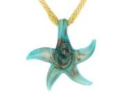 https://www.ross-simons.com/944108.htmlnnHandcrafted in Italy, our 62x65mm Murano glass starfish swirls with turquoise and rose gold hues. Playfully suspending from a golden six-strand Murano glass bead necklace, our seaside style will keep the spirit of summer in your wardrobe all year long! Finishes with a polished 18kt yellow gold over sterling silver lobster clasp with a 2 extender. Murano glass is unique and may vary. Rose and turquoise Murano glass starfish pendant necklace.