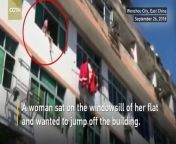 A woman sat on the windowsill of her flat and wanted to jump from the building in Wenzhou City, east China&#39;s Zhejiang Province, on September 26.