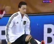 Mesut Ozil plays keepy-uppy with his chewing gum.