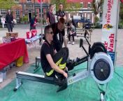 One of the firefighters rowing in Crediton Town Square.AQ 0590