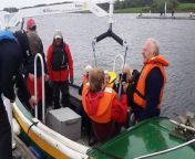 Members of the Rotary Club of Rutland and the Rotary Club of Uppingham visited Rutland Sailability, a charity receiving their donation of a new hoist to help people with limited mobility into and out of sailing boats. Rotarian Di Holden is lifted out of a boat.
