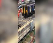 Footage shows the moment a car was pulled off the tracks after being crushed by a train at a crossing. &#60;br/&#62;&#60;br/&#62;The black Suzuki SUV was removed by Network Rail staff, after it was hit by a train near Redcar Central station, on May 1. &#60;br/&#62;&#60;br/&#62;The crumpled bonnet of the car can be seen barely hanging on – with the front bumper dragging along the ground.