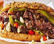 A Chicago classic, this Italian beef sandwich recipe has slow-cooked roast in au jus on a soft French roll with spicy giardiniera and roasted sweet peppers.