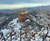 Schools remained closed in Athens on Tuesday as the Greek capital and the Acropolis lay under a blanket of snow.